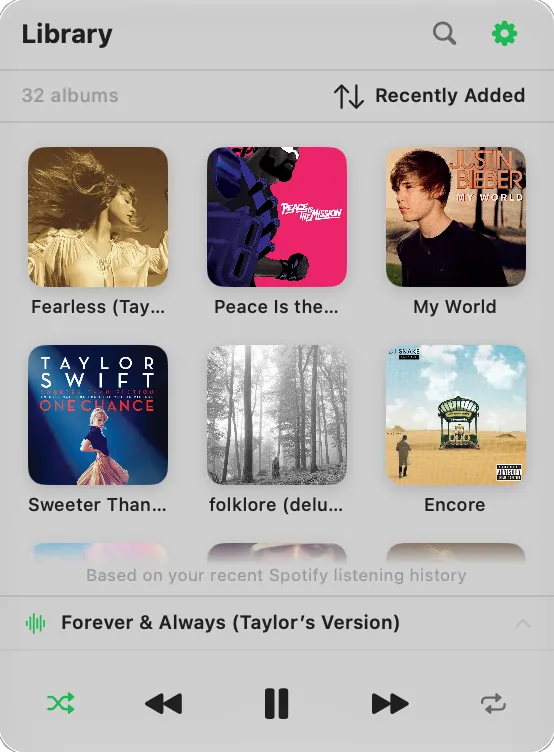 Toggle Music showing the album library as a grid of covers