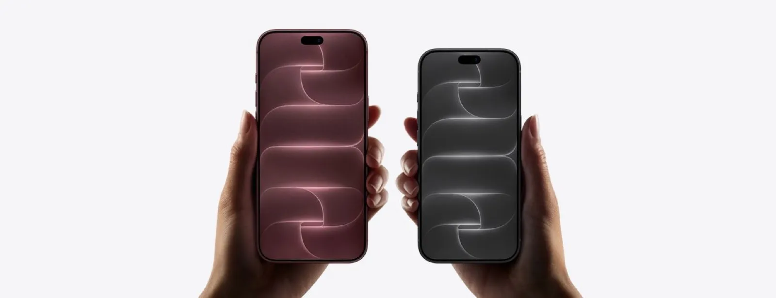 iPhone 18 Pro e Pro Max tenuti in mano, nelle finiture bordeaux e nera, con i nuovi sfondi animati